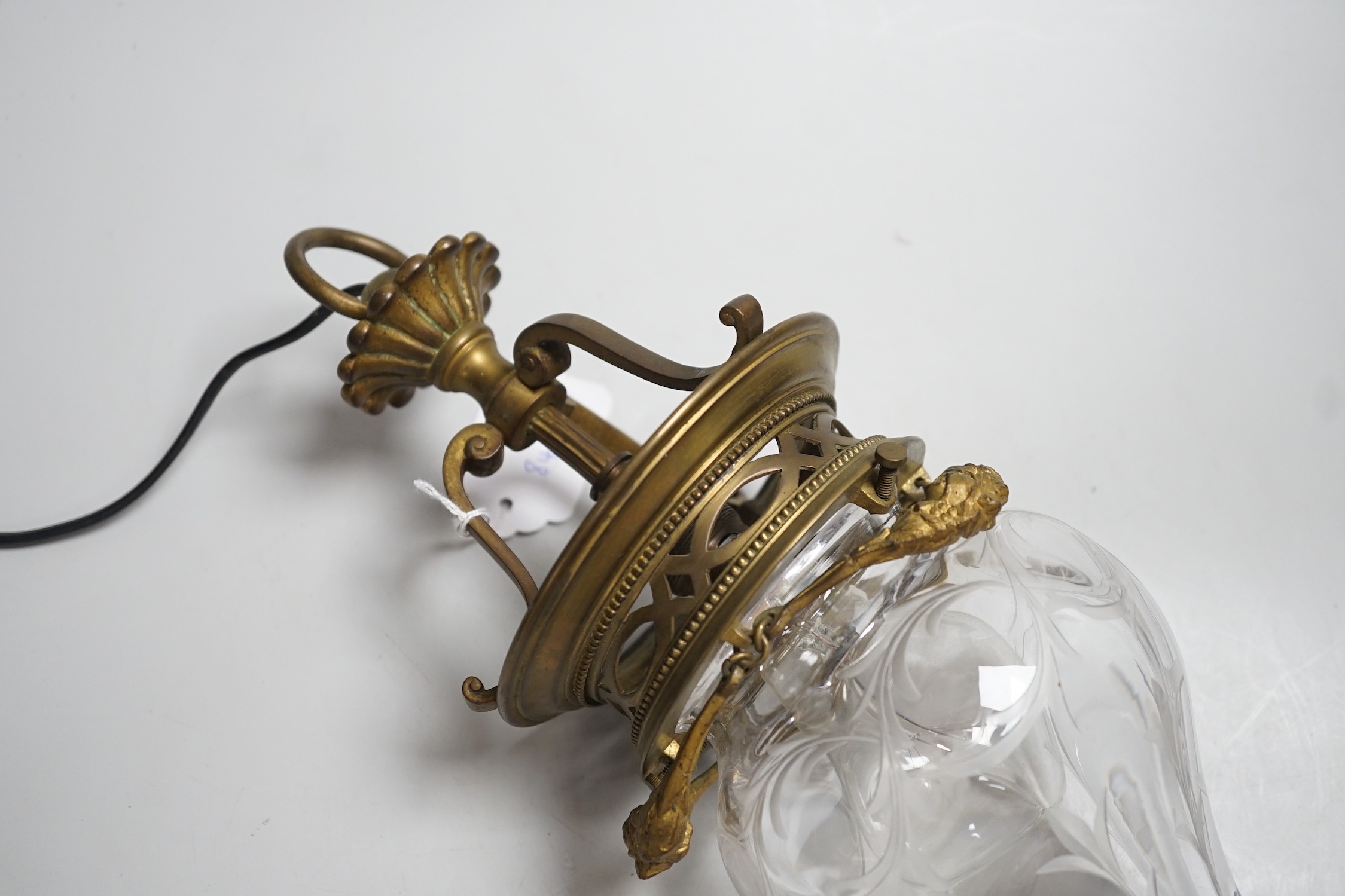 A Art Nouveau brass and engraved glass ceiling shade., 35cm high
